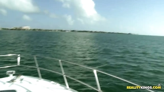 Courtney Cummz showing her sexy curves on the yacht