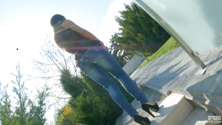 Anita Bellini slides out of her tight jeans outdoors