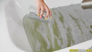 Violet Myers takes the bath and shows off her big melons