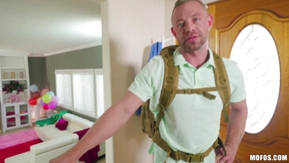 Stevie Grey gets dumped out of the luggage and starts stripping