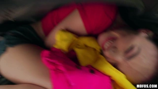 Stevie Grey gets dumped out of the luggage and starts stripping