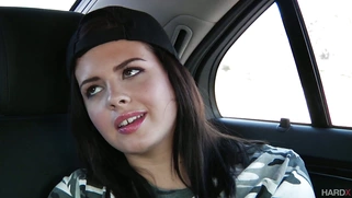 Keisha Grey squeezing her big natural tits on the backseat