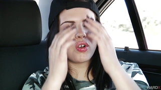 Keisha Grey squeezing her big natural tits on the backseat