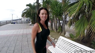 Franceska Jaimes in a leggings posing on the bench in public