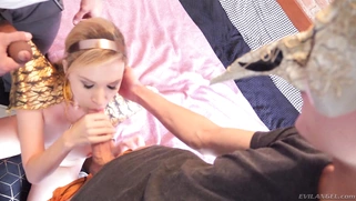 Angel Piaff is sucking two big cocks