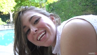 Riley Reid in sexy pink panties posing by the pool