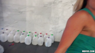 Busty blonde stunner Corinna Blake teases before a bath