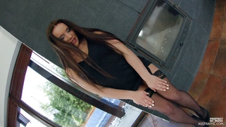 Fine floozy Wendy Moon teases in her blue lingerie and stockings