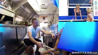 Marsha May works a busy hot dog stand while getting her tight pussy eaten
