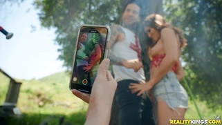 Paige Owens is sucking Small Hands' cock outdoors