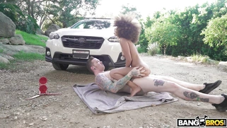 Cecilia Lion rides Johnny Goodluck outdoors