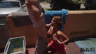 Teen Emma Hix on her knees is sucking cock