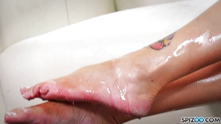 Tattooed Lolly Ink is sucking cock and licking balls