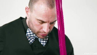 Adria Rae hanging on the ropes is sucking cock