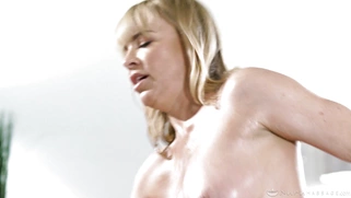 Dana DeArmond rides Rion King in cowgirl position