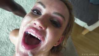 Elen Million gets facialed by two big cocks