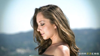 Remy LaCroix having fun with hula hoop outdoor