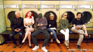 Jasmine James strips down in front of all the other customers at the laundromat