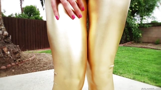 Foxy babe Marley Brinx posing and stripteasing in the garden