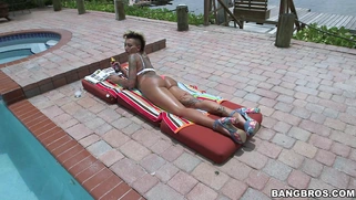 Bella Bellz oiling up her monstrous booty