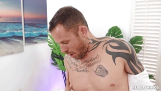 Bridgette B on her knees is sucking cock