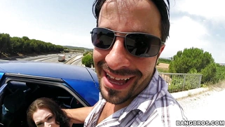 Harmony Reigns sitting on the backseat gives an okay blowjob