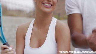 Busty August Ames flirting with her tennis couch