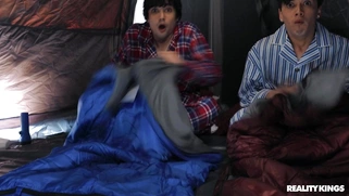 Britney Amber serves two cocks in the tent