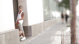 Jimena Lago leads Chris into a recessed doorway and does a public blowjob