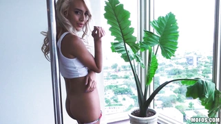 Playful blonde teen Janice Griffith shows striptease