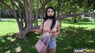 Asian Mina Moon is getting picked up outdoors