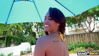 Kelsi Monroe shows off her amazing ass by the pool