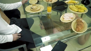 Alexis Crystal is sucking the big cock under the table