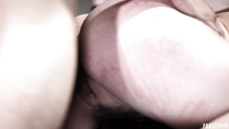 Lena Paul is sucking the cock being fucked from behind