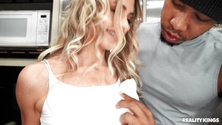 Khloe Kapri on her knees is sucking the huge black shaft