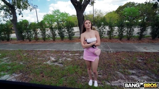 Penelope Kay is getting picked up outdoors