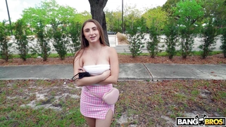 Penelope Kay is getting picked up outdoors