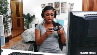 Amari Anne on her knees is sucking Alex Jett's cock