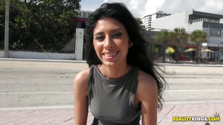 Young mexican teen Angel Del Ray giving interview outdoor