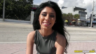 Young mexican teen Angel Del Ray giving interview outdoor