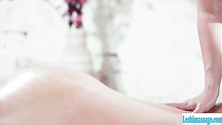 Brunette masseuse licks her milf client