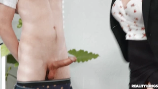 Melody Foxx in glasses is sucking the cock