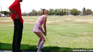 Karla Kush teasing her golf instructor with her short skirt