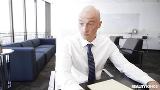 Azul Hermosa is sucking Zac Wild's cock on the desk