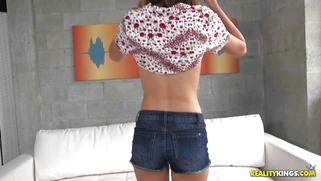 Joseline Kelly showing off her perky tan-lined tits