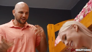 Braylin Bailey on her knees is sucking cock and licking balls