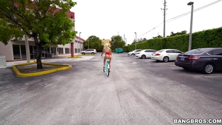 Big boobed Nina Kayy rides her bike out in public