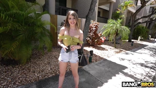 Alexa Kiss is getting picked up outdoors