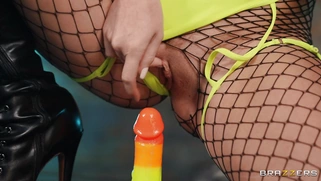 Callie Black in sexy outfit rides the rainbow dildo