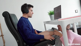 Angie Lynx is sucking Jordi's cock under the desk